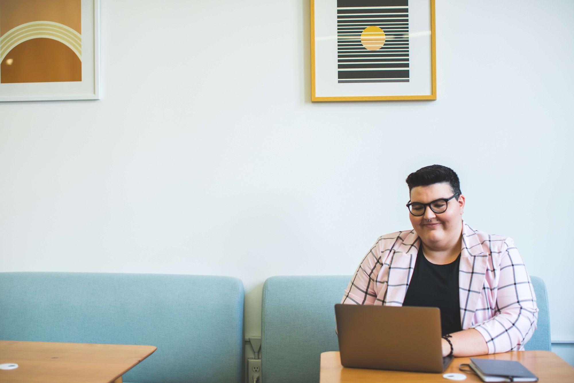 Man smiling at laptop